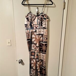 Guess silk jumpsuit with gold chain straps